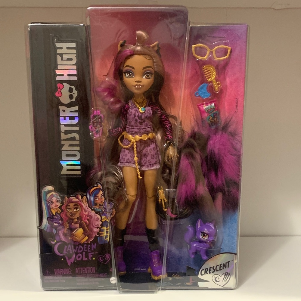 Monster High Clawdeen Wolf Fashion Doll with Purple Streaked Hair & Pet Dog